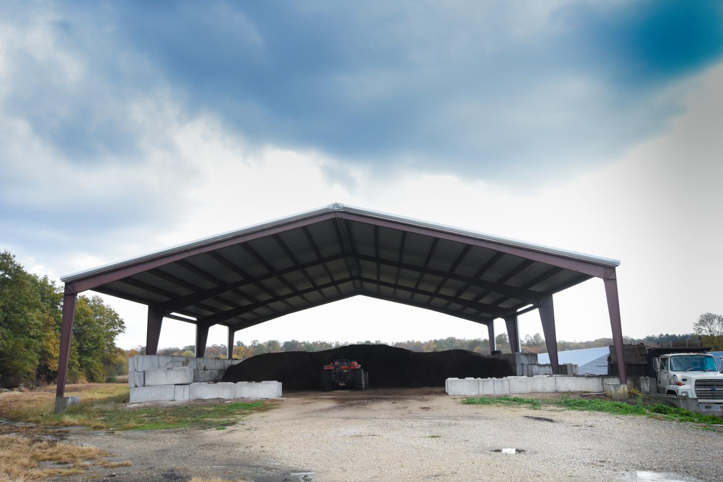 Kenny Lecocq, an Indiana turkey farmer, is enrolled in the Natural Resources Conservation Service's EQIP program. Lecocq received help building a manure storage shed and learned how to use the turkey waste on his fields.