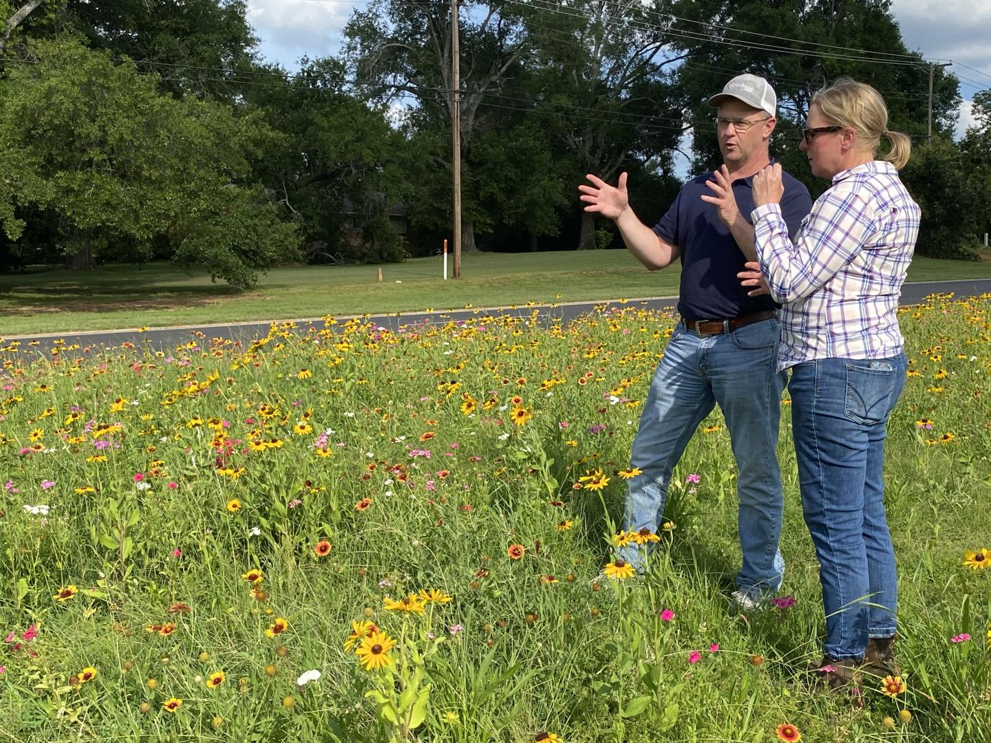 State Resource Conservationist Charles Kneuper and the East Texas PMC Agronomist Dawn Stover discuss how the planting is going in Nacogdoches, Texas.