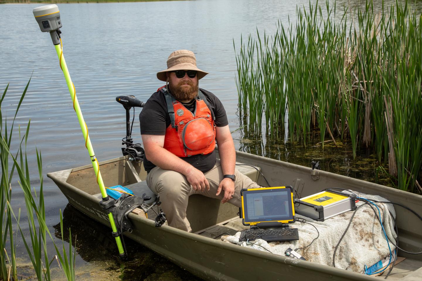 Engineer taking a bathymetric survey