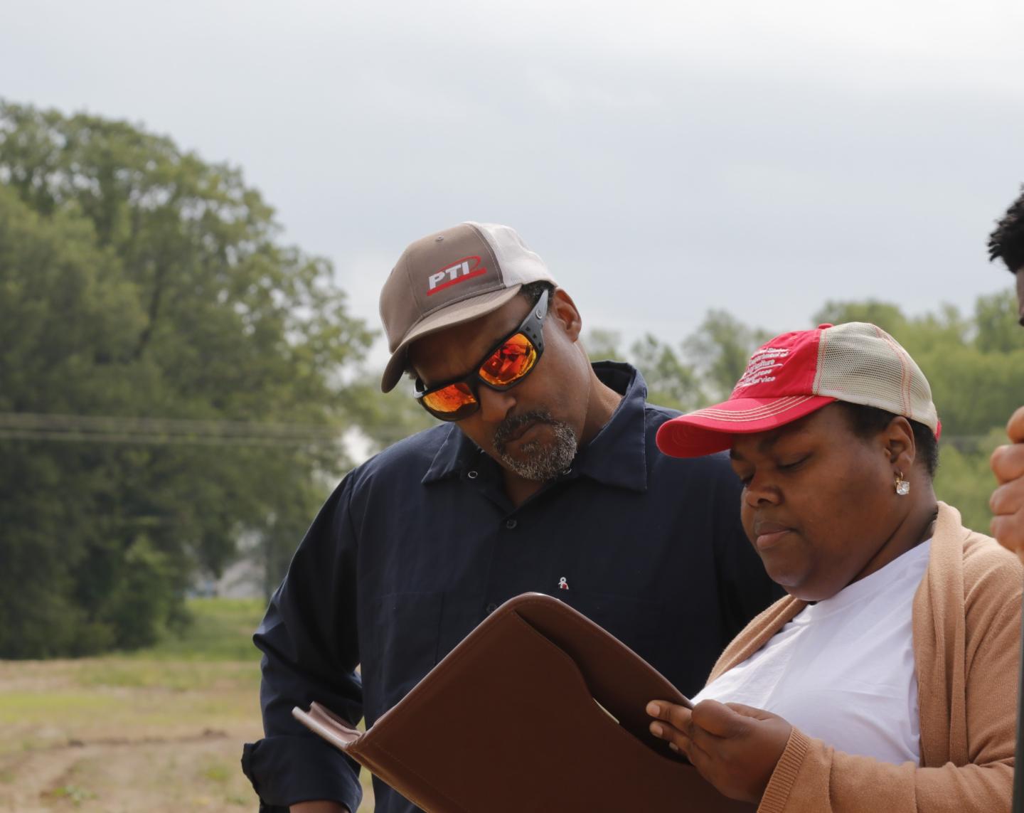 District Conservationist Derinda Applewhite provides technical assistance to producer Derrick Young