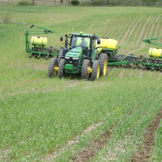Greg Woll applies nutrients to his no-till corn field in Indiana. 