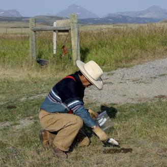 Producer Ted Hall using the Nutritional Balance Analyzer Testing Kit, West of Browning. Blackfeet Reservation, MT. August 2012.