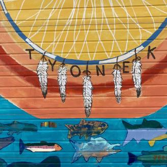 A mural depicting fish in Tyonek Alaska