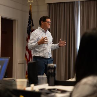 Travis speaking to students at Conservation Planning Part II course