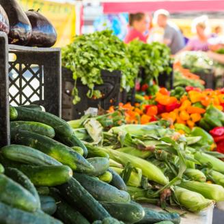 vegetables at a farmers market stand