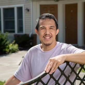 Union Valley Apartments Resident David Pham talks about living and caring for his elderly mother at the Union Valley Apartments who participate in two U.S. Department of Agriculture USDA Rural Development RD Multifamily Housing programs that assists the property owners and residents, in Finleyville, PA, on Sept. 2, 2021. Mr. Pham mentions excellent maintenance, low-rise showers for his mother to step into and sit down, and the smooth level sidewalks that make it easy for his mother to take a lap with her w