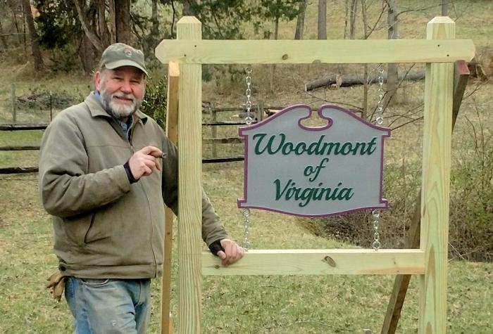 David Bridges with his farm sign in Franklin County, Va.
