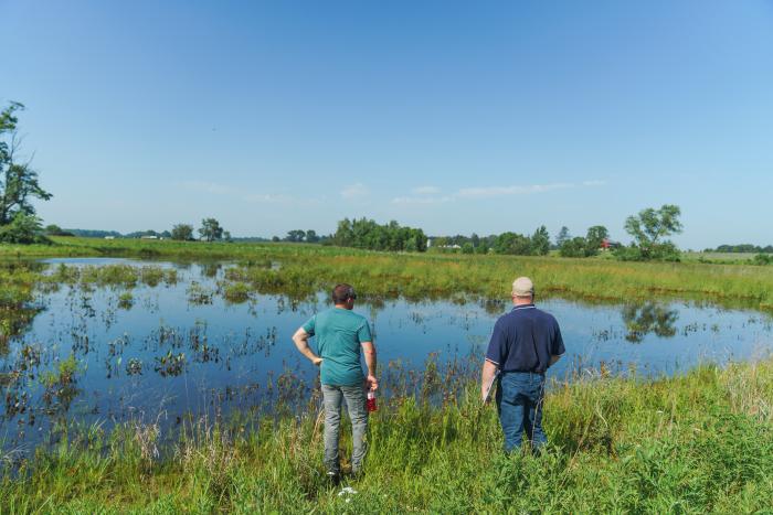 John Bellman (left) gives a tour of his Wetland Reserve Easement in Marshall County, Indiana to Troy Manges, Indiana NRCS district conservationist, on June 14, 2022.