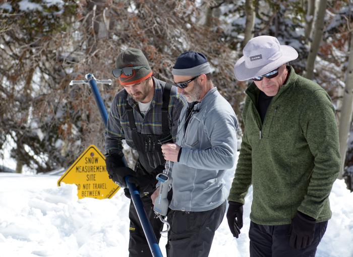 Snow Survey Team collects a snow sample in Alta, Utah.