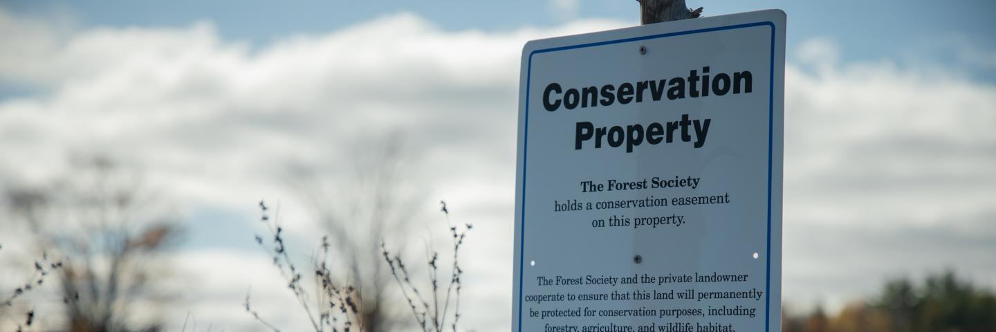 A property marker delineates a parcel in conservation easement under USDA's NRCS Agricultural Conservation  Easement Program - Agricultural Land Easement (ACEP-ALE)
