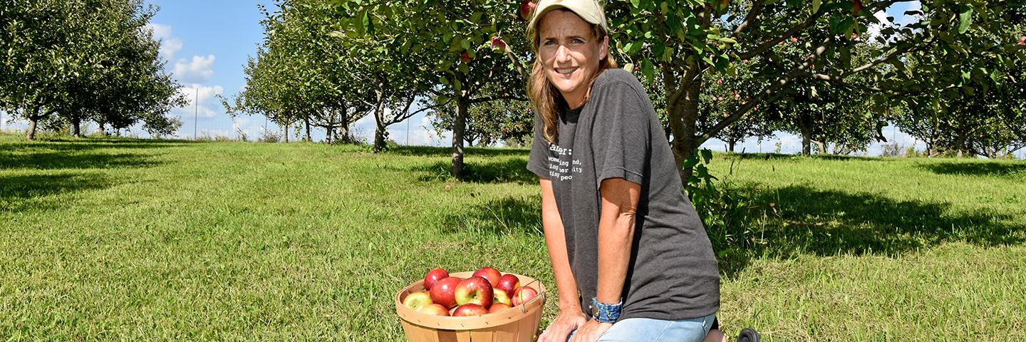 Becky Housberg's Clarke County Orchard is prospering after USDA soils information helped her start on the right track.