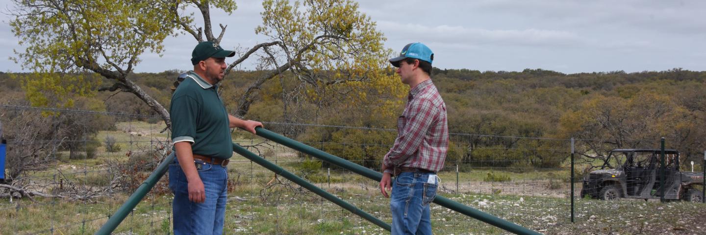 NRCS employees inspecting cross-fencing recently installed in Texas