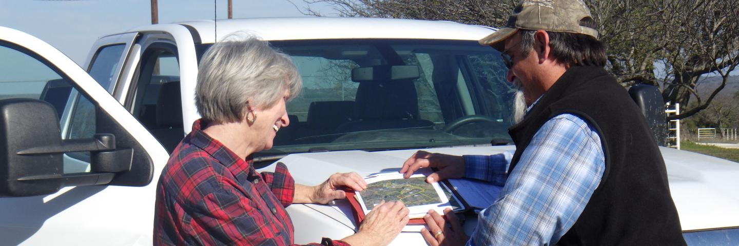 Lee Putty working with NRCS employee in Texas.