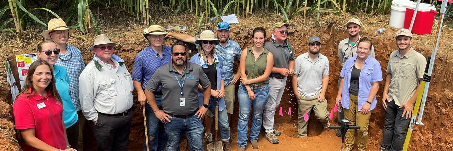 Virginia conservationists in a soil pit.