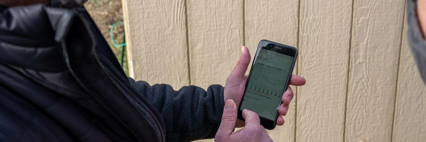 Indiana NRCS Assistant State Conservationist for Technology Shannon Zezula reviews water date from School Branch.