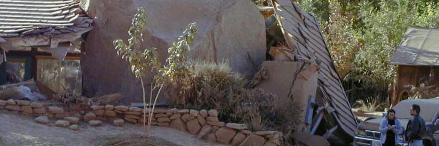 A large boulder that has crushed a building in Zion National Park.