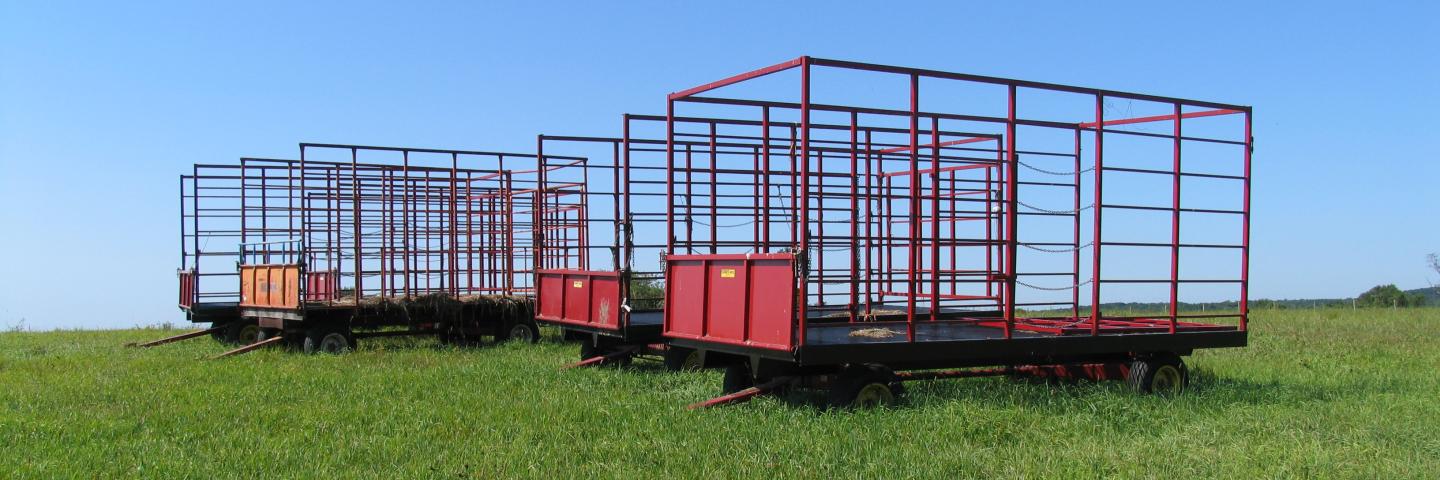 Hay wagons in a field