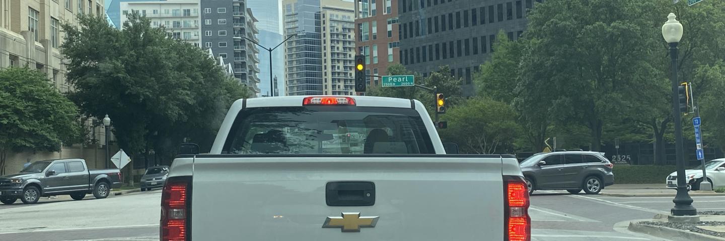 Government truck on downtown Dallas, Texas street