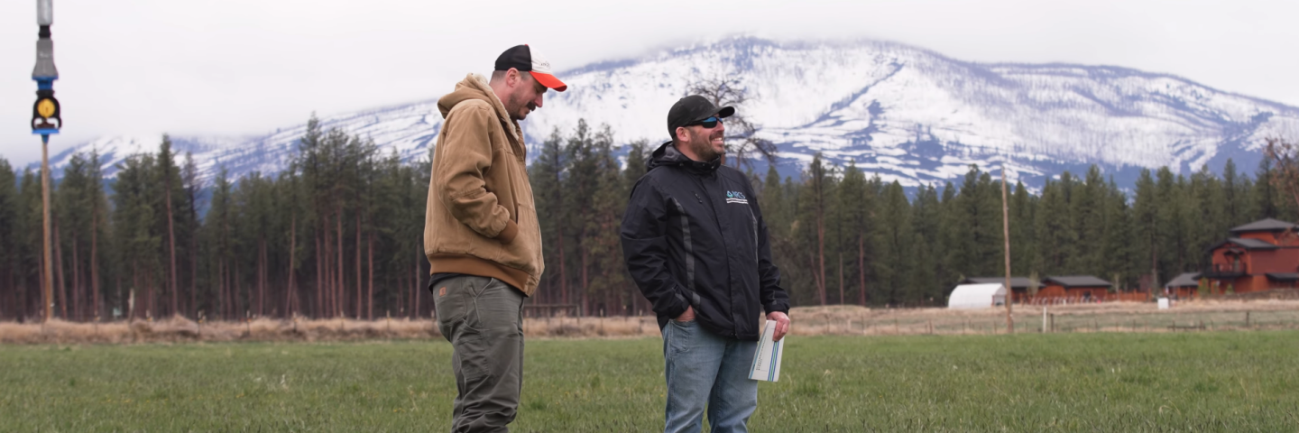 John and Lars stand in John's field at Lazy Z Ranch in Sisters, Ore.