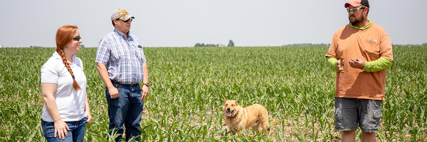 Linn County producer Jacob Kubik, NRCS District Conservationist, Helen Leavenworth and NRCS Soil Conservationist, Dylan Childs discuss how variable soils and drought impacts his crops.