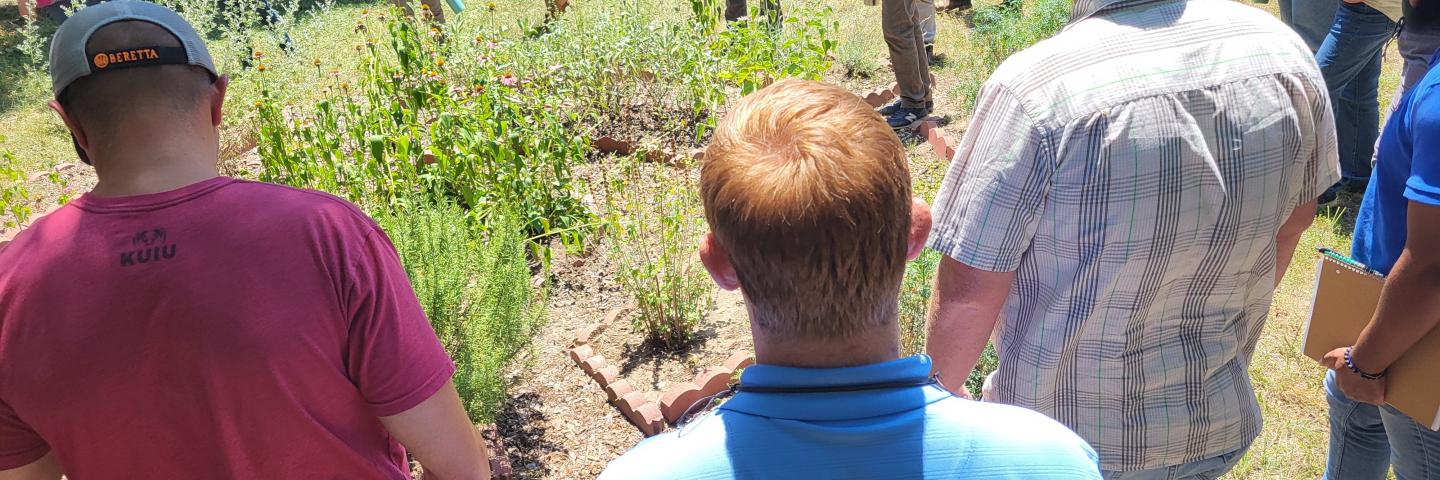 Hector Lopez of Hawk’s Nest Healing Gardens speaking with USDA NRCS employees.