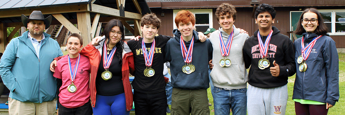 NRCS State Resources Conservationist, Cassius Spears, Jr. (left), awarded 2025 RI Envirothon Champs, Wheeler School, Team 1, which will be representing Rhode Island at the International Envirothon competition.