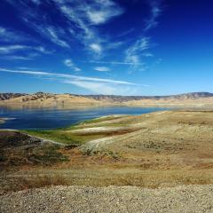 Low water caused by severe drought on the San Luis Reservoir, CA in 2014. USDA photo by Cynthia Mendoza. 