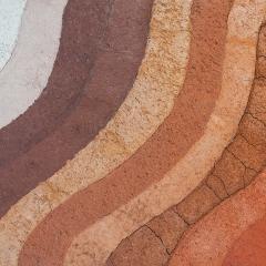 Strips of soil in varying colors.