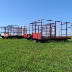 Hay wagons in a field