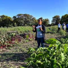 Refugee from Bhutan shares about her specialty crops on her urban farm.