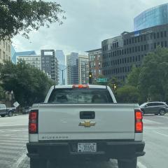 Government truck on downtown Dallas, Texas street
