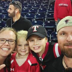 Kathleen Traweek and family during a Texas Tech game.