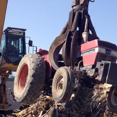 Disposal of old diesel tractor being replaced through combustion system improvement conservation practice.