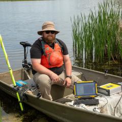 Engineer taking a bathymetric survey