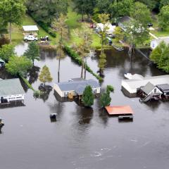 An aerial view taken from a Coast Guard helicopter showing the continuing effects of flooding caused by Hurricane Joaquin in the area of the Black River, in Sumpter County, S.C., Oct. 6, 2015. U.S. Coast Guard photo by Petty Officer 1st Class Stephen Lehmann 
