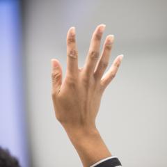 A hand is raised for questions during the U.S. Department of Agriculture (USDA) and U.S. Environmental Protection Agency (EPA) sponsored National Civil Rights Conference, at the U.S. Institute of Peace in Washington, D.C. on Wednesday, Nov. 4, 2015. This interactive training event will feature voices of experience, research, discussions, and thought-provoking dialogue. Workshop, Panel and Town Hall sessions will feature representatives from federal and local governments, tribes, community groups, business a