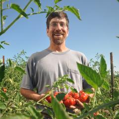 With an emphasis on soil health, Chris Roehm (shown here) and his wife Amy Benton own and operate Square Peg Farm, which is a certified organic produce farm located near Forest Grove, Oregon.