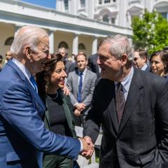 President Joe Biden, Commerce Secretary Gina Raimondo greet Agriculture Secretary Tom Vilsack and guests after delivering remarks on lowering costs and expanding access to the internet through the Affordable Connectivity Program, part of the Bipartisan Infrastructure Law, Monday, May 9, 2022, in the Rose Garden of the White House. (Official White House Photo by Adam Schultz)