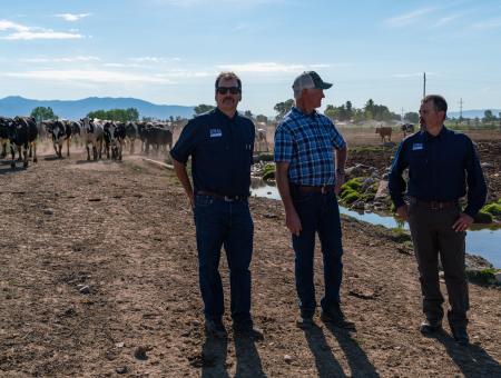 NRCS District Conservationist Chris Mahony, Producer Gary Flikkema and NRCS District Conservationist Justin Meissner at 3-F Dairy, Gallatin County, MT.