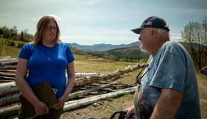 USDA, NRCS District Conservationist for Coӧs County, Kelly Eggleston (left) speaks with landowner Robert ‘Bob’ Kidder (right) at his property in Stark, N.H. May 13, 2022.  Kidder recently closed on putting his land into a conservation easement that will protect it in perpetuity. (USDA photo by Jeremy J. Fowler, NRCS, N.H.)