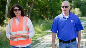 Monica Duke, NRCS Engineer, discusses outstanding contract items with Alan Black, Harris County Flood Control District Director.