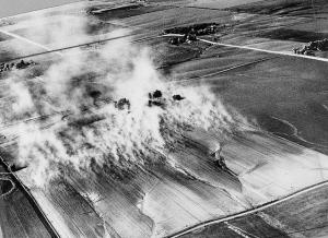 Black and white photo of dust rising during the Dust Bowl.