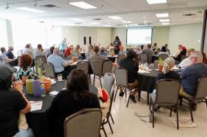Coy Poitere teaching urban agriculture workshop in Texas.