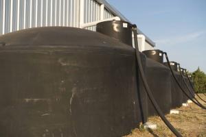 Rainwater Harvesting System Tanks at Albus Farms in Hockley, Texas.