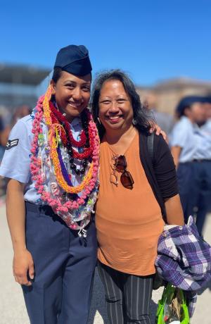 Sarah Tanuvasa poses in uniform with her mother Maxine