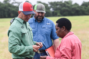 Elizabeth enjoys not only conserving the natural resources on her property but also learning more about them, especially plant identification.