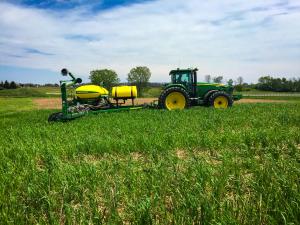 Tractor seeding in a cover crop
