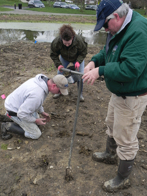 Earth Day Volunteers plant a new wetland