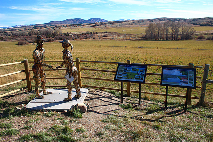 Sculpture and interpretive signs at Deep Creek pull-out.