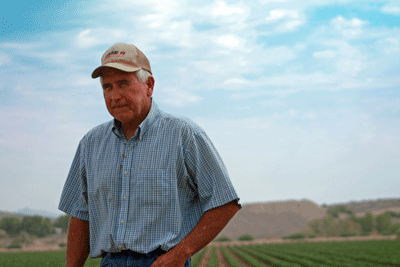 Farmer in Florence, Ariz. works with NRCS to land level his fields.